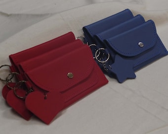Red and blue leather wallets. Leather wallets with multiple card/money pockets. Made in the USA. Great holiday stocking stuffer.