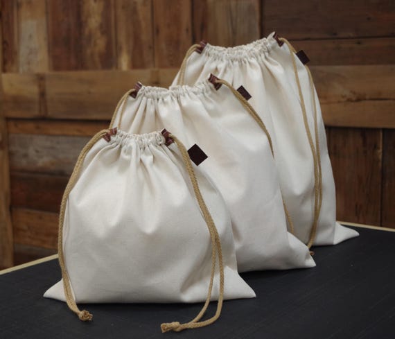 Heavy cotton canvas dust/gift/storage bag. 100 percent cotton canvas. Made in the USA