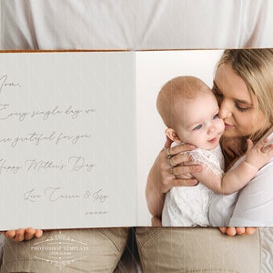 May include: A white photo album with a brown leather cover is open to a page with a photo of a mother and baby. The photo shows the mother kissing the baby on the cheek. The page opposite the photo has a handwritten message that reads "Mom, Every single day we are grateful for you. Happy Mother's Day Love Carrie & Joey"