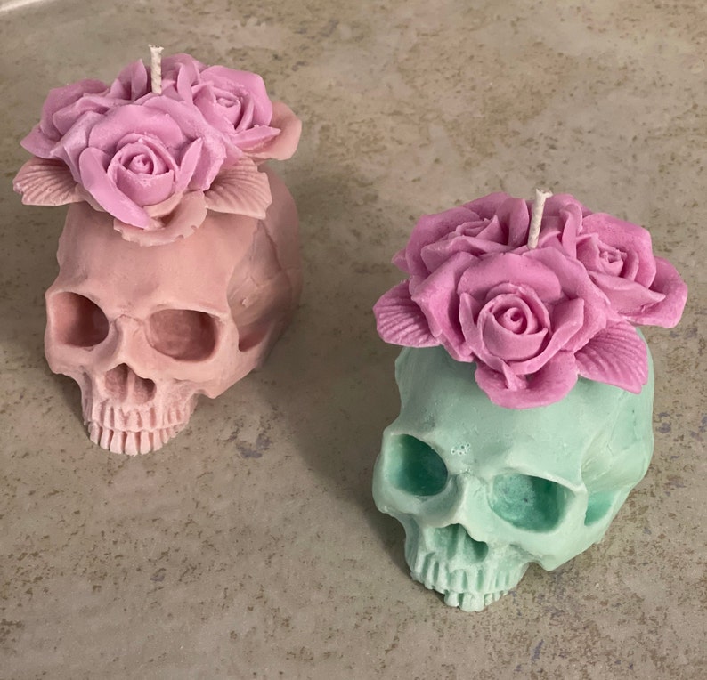 cool halloween decor ideas beautiful pastel skull candles with roses on top