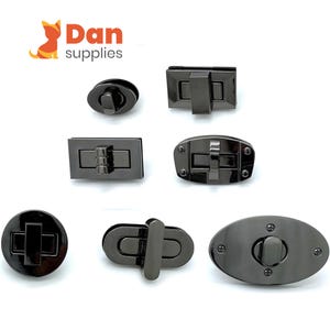 May include: Assortment of seven black metal bag clasps in various shapes and sizes. The clasps are designed for use on handbags, purses, and other leather goods.