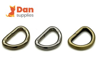 20 anillos en D resistentes de 15 mm (5/8 pulgadas) para bolsas.