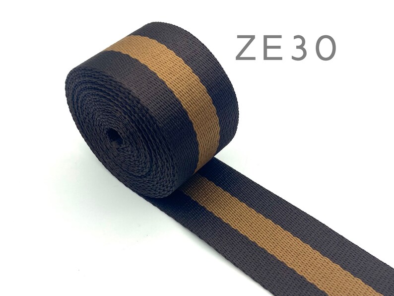 May include: Black and brown striped webbing with the text "ZE30" in the top right corner.