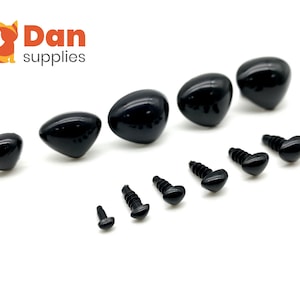 May include: A set of black plastic safety eyes for stuffed animals. The set includes a variety of sizes, including small, medium, and large. The eyes are also available with or without a washer.