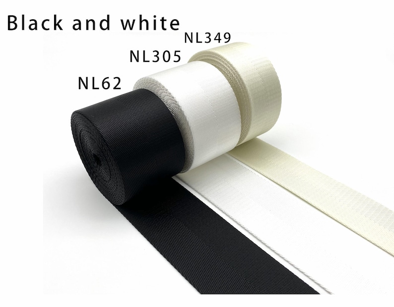 May include: Three rolls of woven webbing tape in black, white, and off-white, labeled NL62, NL305, and NL349 respectively. The text Black and white is printed at the top. Each roll features a tight, durable weave texture and a flat, smooth finish.