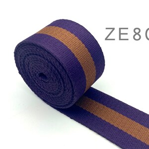 May include: Purple and brown striped webbing with the text "ZE80" in the top right corner.