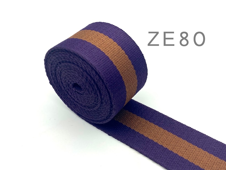 May include: Purple and brown striped webbing with the text "ZE80" in the top right corner.