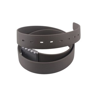 May include: A brown, reversible belt with a silver buckle. The belt is made of a smooth, rubber-like material.