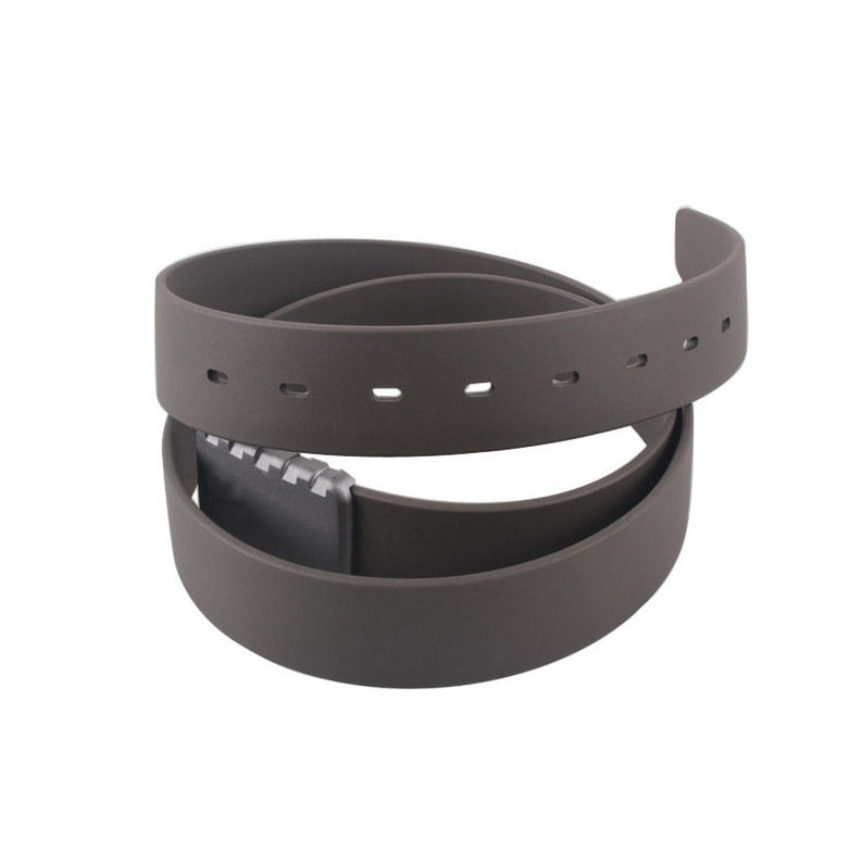 May include: A brown, reversible belt with a silver buckle. The belt is made of a smooth, rubber-like material.