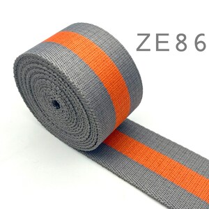 May include: Grey and orange striped webbing with the text "ZE86" in the top right corner of the image.