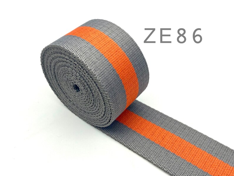 May include: Grey and orange striped webbing with the text "ZE86" in the top right corner of the image.