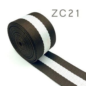 May include: Brown and white striped webbing with the text "ZC21" in the top right corner of the image.