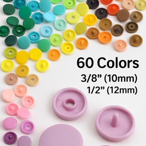 May include: A selection of 60 coloured snap fasteners in a variety of hues, including blue, green, yellow, orange, and pink. Sizes include 10mm and 12mm options. The text "60 Colors" is displayed.