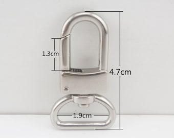 8 ganchos giratorios de 19 mm (3/4") para bolsos y bolsos.