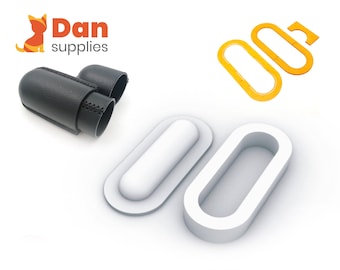 May include: Two white oval-shaped moulds for making resin crafts. One mould is solid, and the other has a hollow centre. A black leather case with a zipper is also shown.