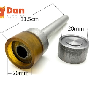 May include: A metal tool with a wooden and metal component, and a separate metal piece. The tool is 11.5 cm long, with a 20 mm diameter. The text "Dan supplies" is visible in the upper left corner.