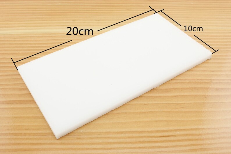 May include: A white rectangular foam sheet measuring 20 inches by 10 inches.