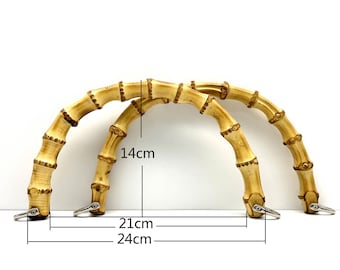May include: Three natural bamboo handbag handles with metal rings. The handles are 14 inches long, 21 inches wide, and 24 inches tall.