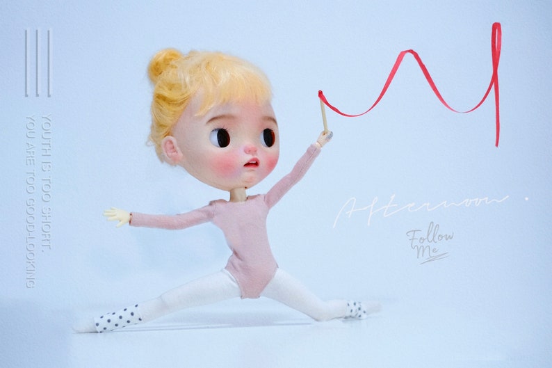May include: A doll wearing a pink leotard and white tights with black polka dots is holding a red ribbon. The doll has blonde hair and is posed in a split. The background is a light blue. The text "Afternoon. Follow Me" is written in white on the right side of the image.