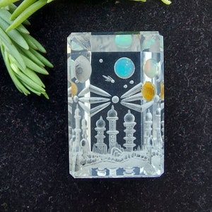 Amazing handcrafted crystal Quartz fantasy cut with Ethiopian Opal/ crystal Quartz carving. Weight 54.40 carats. Size 29X19X10.1 mm approx