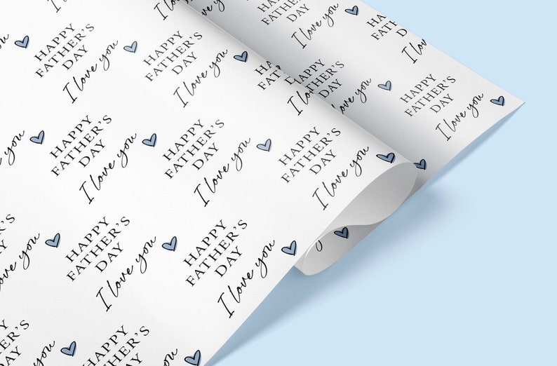 May include: White wrapping paper with a repeating pattern of blue hearts and the text "Happy Father's Day I love you".