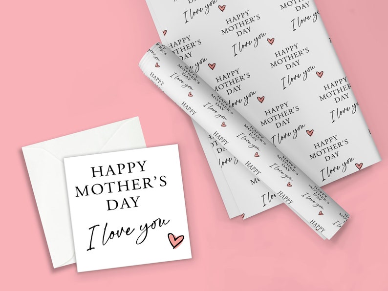 May include: White gift wrap with a repeating pattern of "Happy Mother's Day I love you" with a pink heart. A white card with the same text is on a pink background.