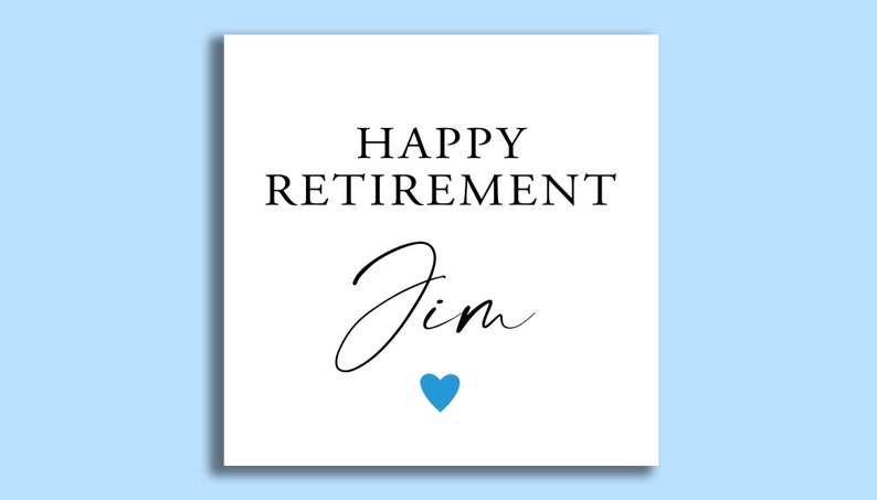 May include: A white card with black text that reads "Happy Retirement Jim" with a blue heart below the text.