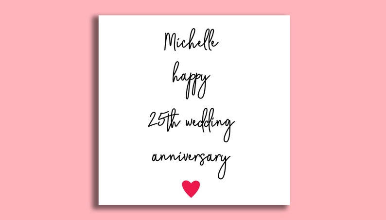 May include: A white card with black text that reads "Michelle happy 25th wedding anniversary" with a red heart at the bottom.