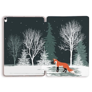 May include: A red fox stands in a snowy forest scene with bare trees and evergreen trees. The background is a dark blue with white snowflakes.