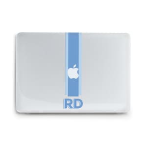 May include: A silver laptop skin featuring a vertical light blue and pale blue stripe running down the center. The design includes a white Apple logo centered on the stripe and the letters RD in light blue block font positioned below the logo.