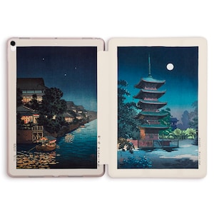 May include: Two Japanese woodblock prints depicting nighttime scenes. The left print shows a river with a boat and buildings along the shore. The right print shows a pagoda with a full moon in the sky.