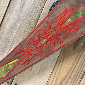 handpainted green & red vintage saw 30”