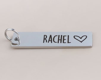 Additional extra name tag addition to the personal key ring