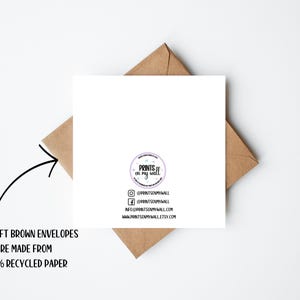 a close up of a piece of paper on top of a card