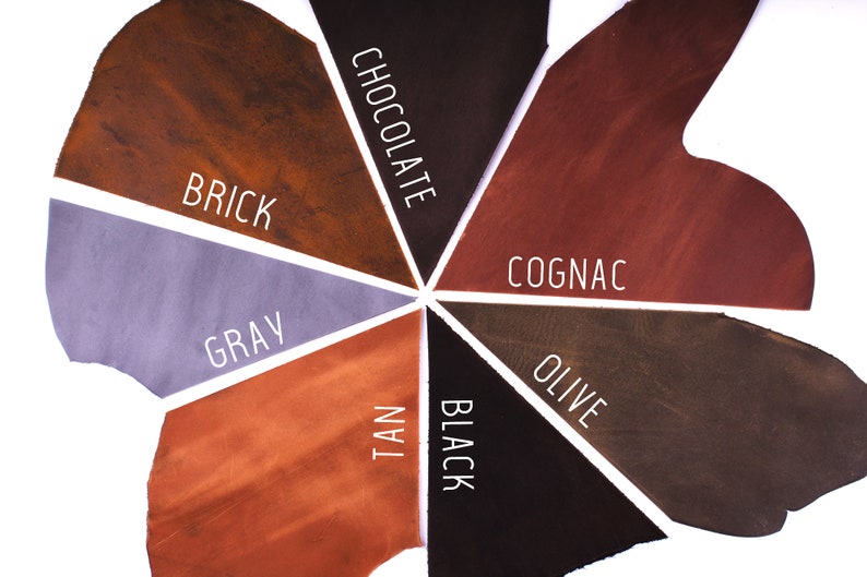 K&ouml;nnte beinhalten: Lederproben in verschiedenen Farben, darunter Ziegel, Grau, Braun, Schwarz, Oliv, Cognac und Schokolade.