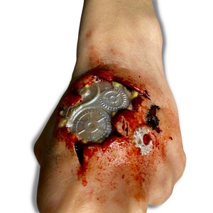 Steampunk wound with gears, silicone prosthetics for Cosplay, LARP, Halloween and special effects makeup. Latex free.