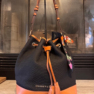 Dooney and Bourke black embossed leather Python snakeskin bucket shoulder bag purse hobo