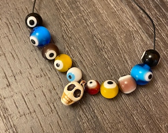 Monster Mash eyeball & skull necklace