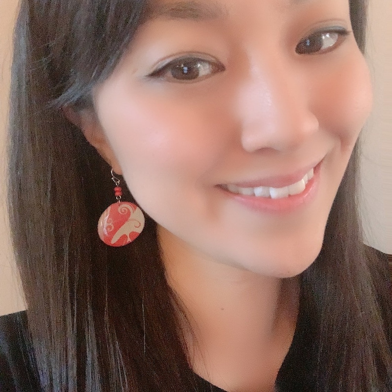 red dangle earrings