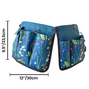 May include: A blue gardening tool belt with multiple pockets and a floral print. The belt is 9.5 inches tall and 12 inches wide.