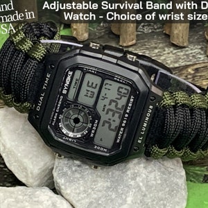May include: A black digital watch with a green paracord band. The watch face displays the time, date, and alarm. The band is adjustable and is handmade in the USA. The watch is water resistant and has an EL backlight.