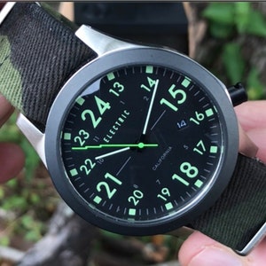 Electric Military Luminous Black Analog Calendar Watch with Zulu Style Green Camouflage Nylon Strap Japanese Movement Water Resistant