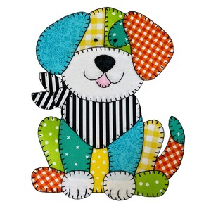 May include: A patchwork fabric dog appliqué featuring a white face, black nose, and pink tongue. The body is constructed from various colourful patterned fabrics including orange gingham, yellow checks, teal floral, and a black and white striped bandana.