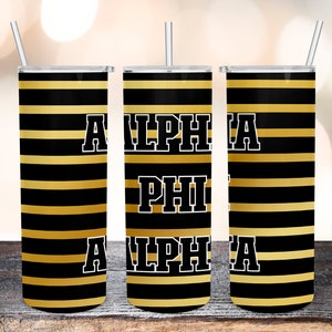 May include: Three black and gold striped stainless steel tumblers with the text "ALPHA PHI ALPHA" printed on them.