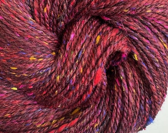 Magma: 289 yards sport weight yarn, hand spun from hand blended fibre