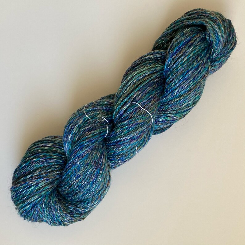 Under the Sea 245 yards sport weight handspun yarn.
