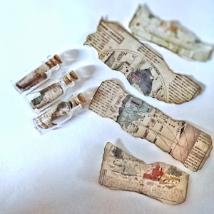 LostWorld line necklaces with maps from around the world written in Japanese, necklaces with glass bottle and ancient maps