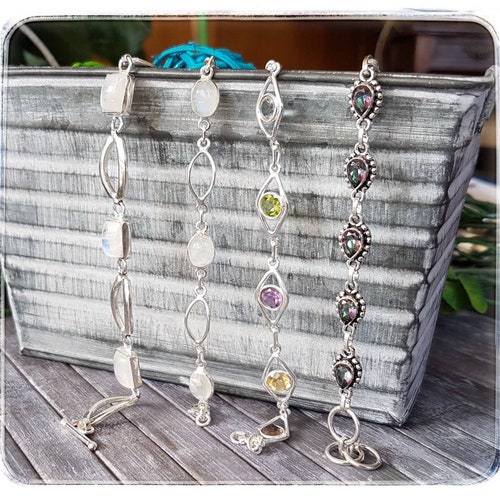 Multigeme bracelet silver 925. Amethyst, buying Citrine, Topaz, Peridot, Blue Topaz, Garnet, Moonstone. Length 20cm (adjustable) Width 1cm.