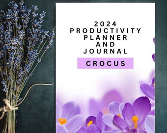 May include: A purple and white planner and journal with the text "2024 Productivity Planner and Journal" and "Crocus" on the front cover. The background is a blurred image of purple crocus flowers.