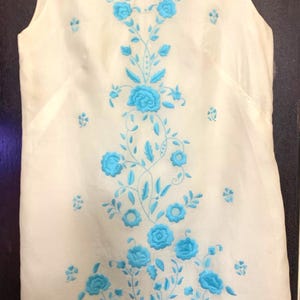 Vintage 60’s off white dress hand sewed from the Manila Hilton! Shift dress with blue embroidered flowers!